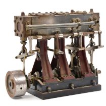 A scale model of a maritime triple expansion live steam engine