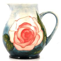 Moorcroft Pottery, 'Roses' design jug, produced for the MCC