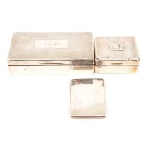 A silver cigarette / jewel box, W T Toghill & Co, Birmingham 1939, another and a card case.