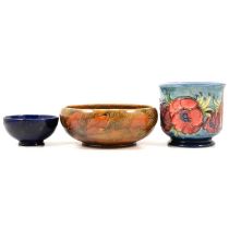 Moorcroft Pottery planter, Clematis pattern, a similar bowl, and a Royal Doulton Autumn Leaf bowl