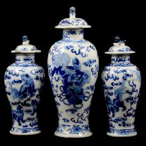 Garniture of three Chinese blue and white baluster-shape vases
