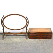Table top set of six small drawers and a toilet mirror,