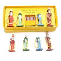 Dinky Toys model 49 Petrol Pumps set, boxed and four loose petrol pumps.
