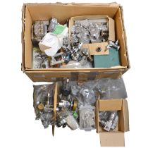 A box of model engine parts and near-complete engines