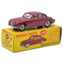 Dinky Toys model 195 Jaguar 3.4 Saloon, dark red body, spun hubs, boxed.