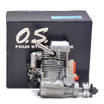 An O.S. FS-26 four-stroke diesel engine, boxed