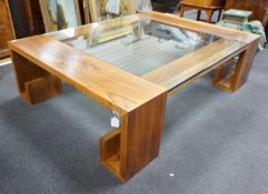 A contemporary hardwood and plate glass coffee table, length 160cm, depth 120cm, height 45cm