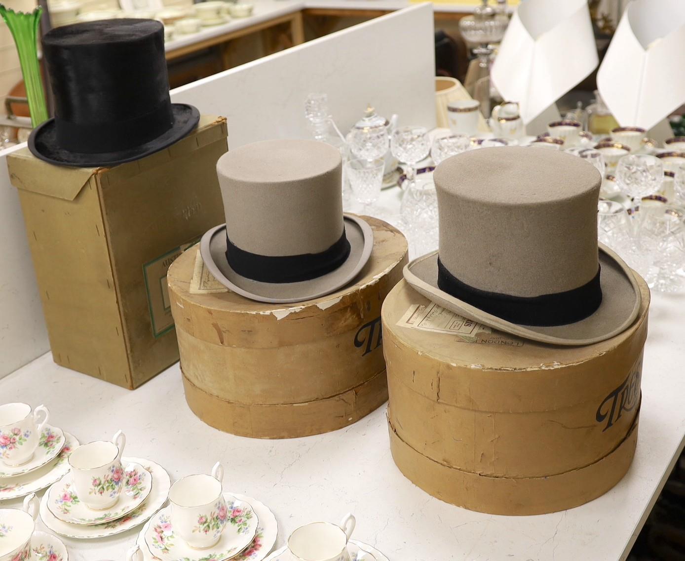 Three boxed top hats