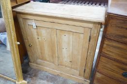 A Victorian panelled pine single door side cabinet, width 96cm, depth 35cm, height 94cm