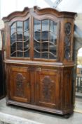 A 19th century Dutch oak and walnut glazed display cabinet, width 174cms, depth 47cms, height