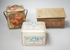A Jacobs embossed coffer shaped biscuit tin, 16cm wide, a Pomegranate design tin after Moorcroft and