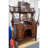 An Arts & Crafts marquetry inlaid mahogany amaryllis pattern side cabinet, in the manner of Shapland