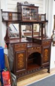 An Arts & Crafts marquetry inlaid mahogany amaryllis pattern side cabinet, in the manner of Shapland