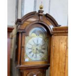 A George III mahogany eight day longcase clock, with an arched brass dial, height 246cm
