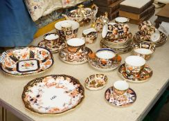 A group of Crown Derby, Davenport and Royal Crown Derby tea and coffee wares