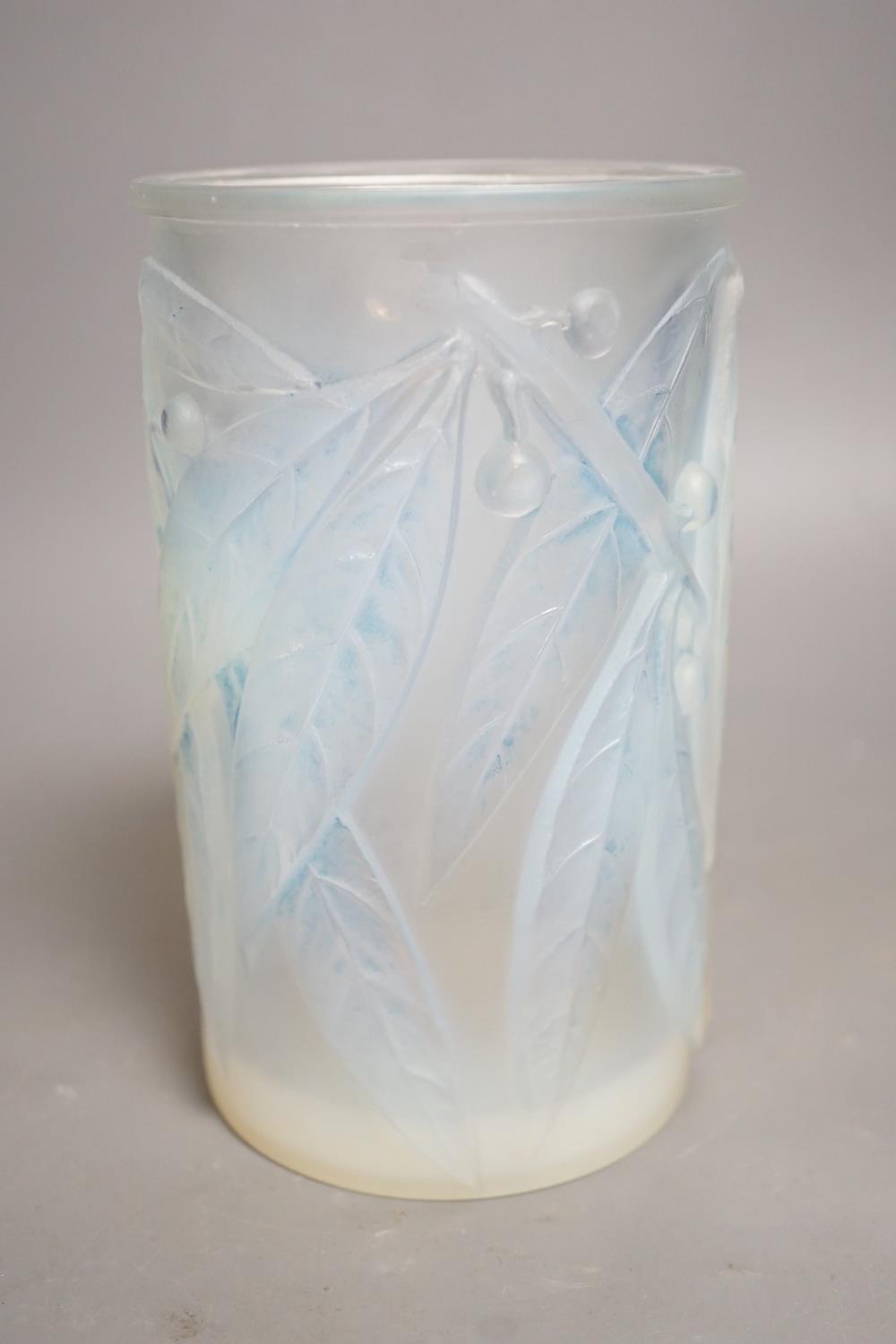 A Lalique opalescent glass vase signed in the mould and numbered to the base 18cm.