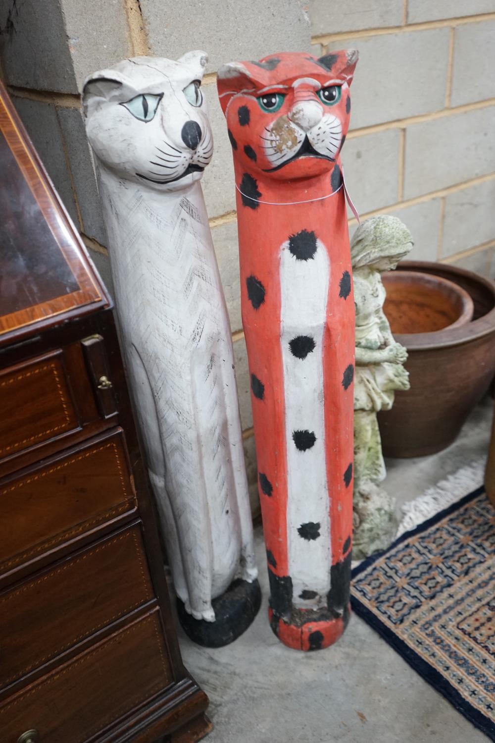 A pair of painted carved wood cats, height 100cm