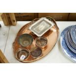 Three copper coasters, an oval tray plated bowl and entree dish,