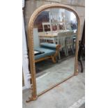 A Victorian style giltwood and composition overmantel mirror, width 136cms, height 138cms.