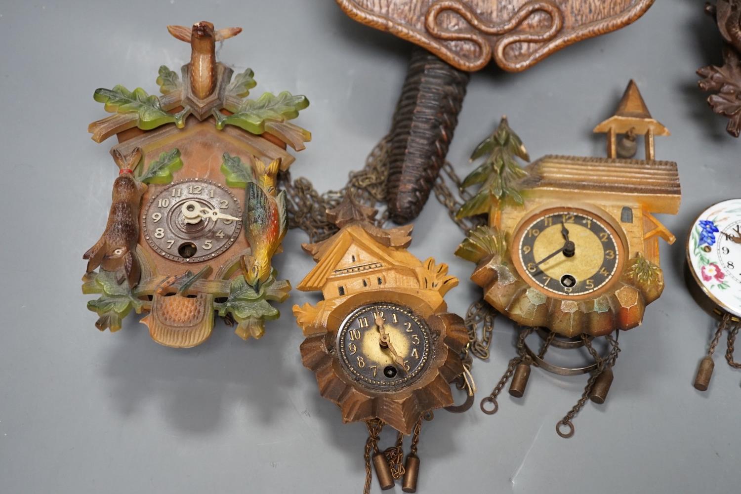 An early 20th century German Jugendstil oak wall timepiece, four miniature Black Forest timepieces - Image 6 of 8