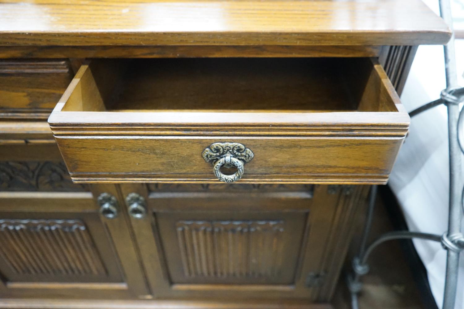 A reproduction 18th century style carved and linen fold moulded oak sideboard width 187cms, depth - Image 3 of 3