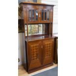 A Secessionist inlaid mahogany side cabinet with mother of pearl inlay and birds eye maple interior,