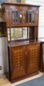 A Secessionist inlaid mahogany side cabinet with mother of pearl inlay and birds eye maple interior,