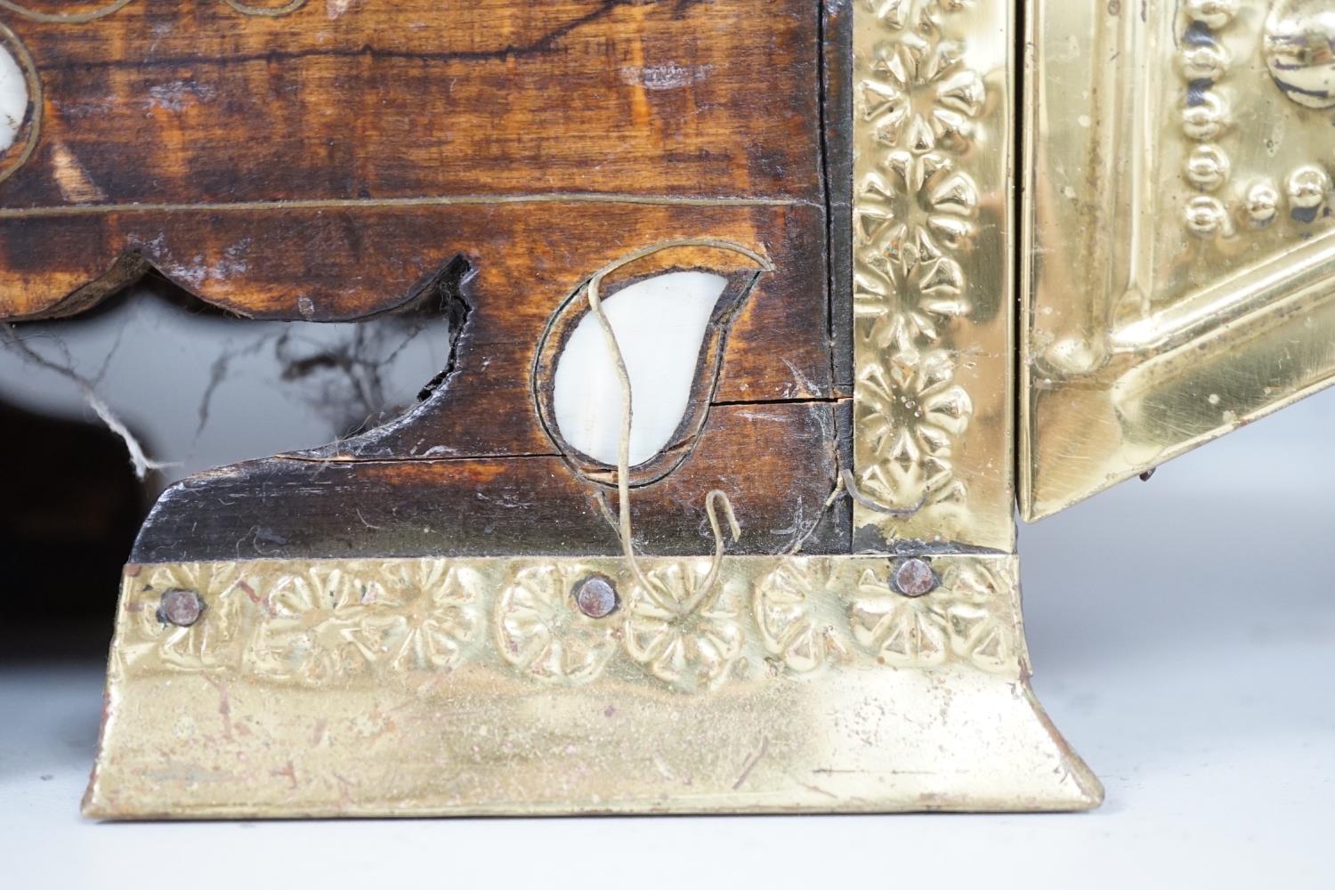 An Indian brass & hardwood shoe shiner's set, with twelve flasks. 57cm. long. 15cm. deep. 28cm. - Image 5 of 5