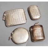 Four assorted late 19th/early 20th century silver vesta cases, including circular, 42mm.