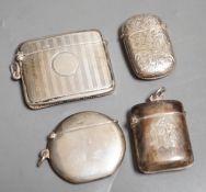 Four assorted late 19th/early 20th century silver vesta cases, including circular, 42mm.