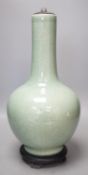 A Chinese celadon glazed Guan type vase on stand, 42 cms high
