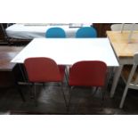 A contemporary John Lewis painted ply and chrome table and four chairs, table width 120cms, depth