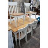 A modern John Lewis part painted extending dining table and eight matching chairs, table width