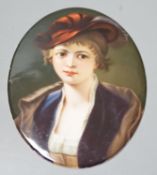 A 19th century oval painted porcelain plaque of a girl, 17 x 13cm
