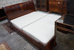 An 'And So To Bed' mahogany kingsize sleigh bed with Prestige two section divan base, width