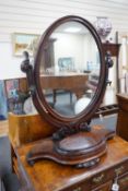 A Victorian mahogany toilet mirror with compartment base, width 66cm, height 82cm