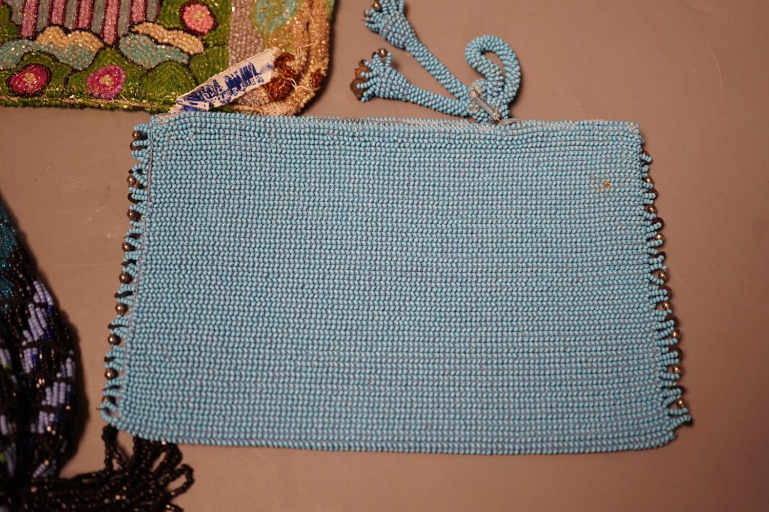 A late 19th century floral bead worked drawstring bag, a later jazz age beaded bag, a turquoise - Image 6 of 7