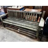 A weathered teak garden bench, length 194cm, height 83cm (a.f.)