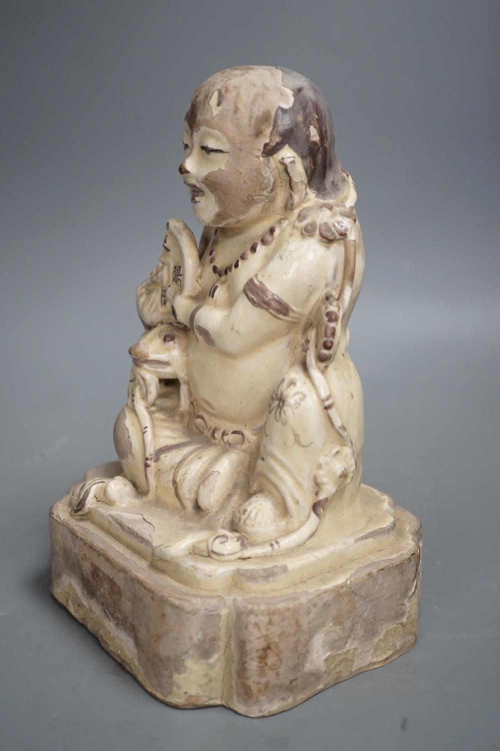 A Chinese Cizhou seated figure of Liu Hai, possibly Ming dynasty, 21cms high, glaze flaking - Image 7 of 10