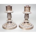 A pair of Victorian silver plated ships storm light candlesticks, glass funnels missing, 19cms high