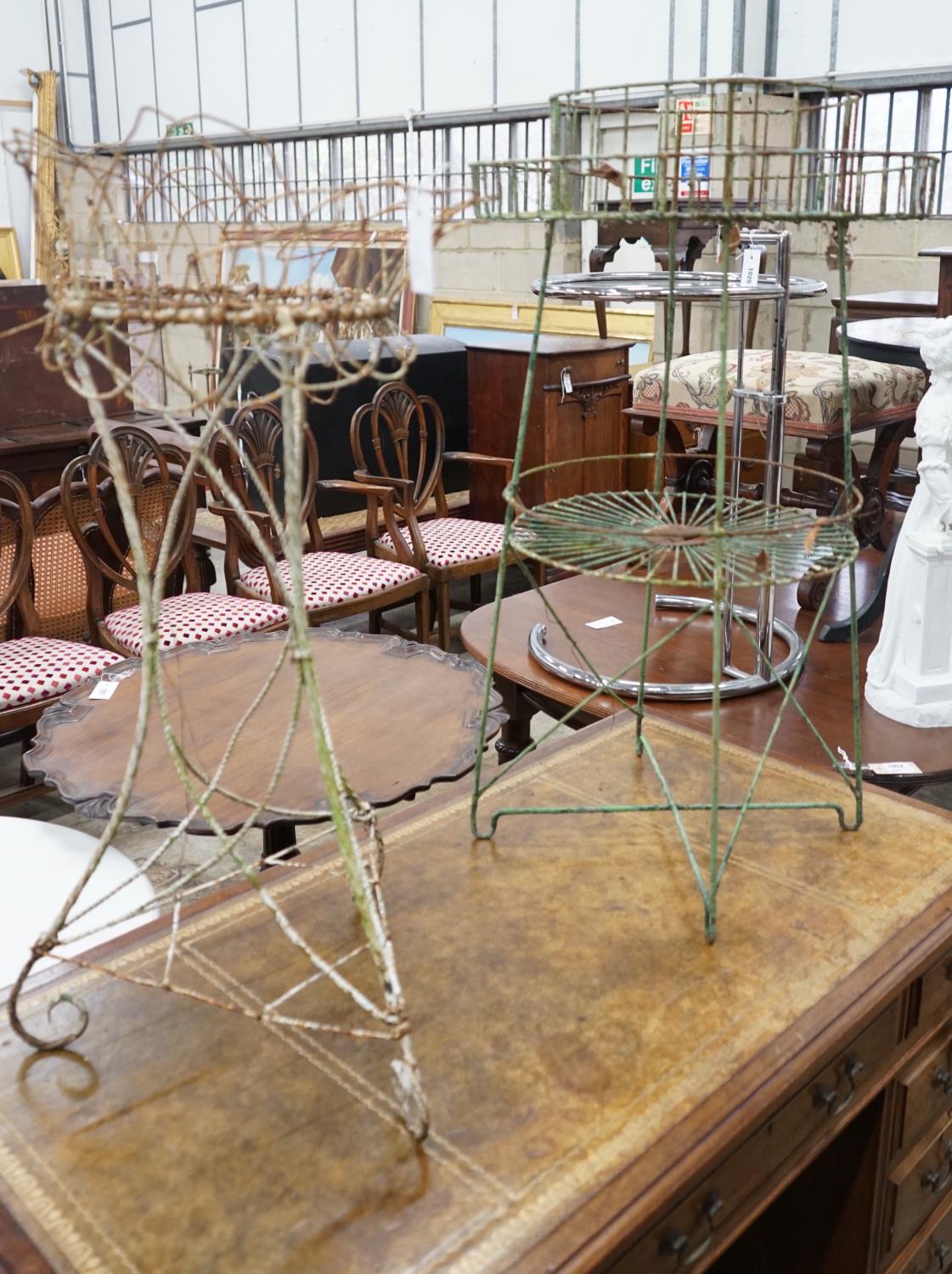 Two Victorian painted wirework pot stands, larger height 90cm