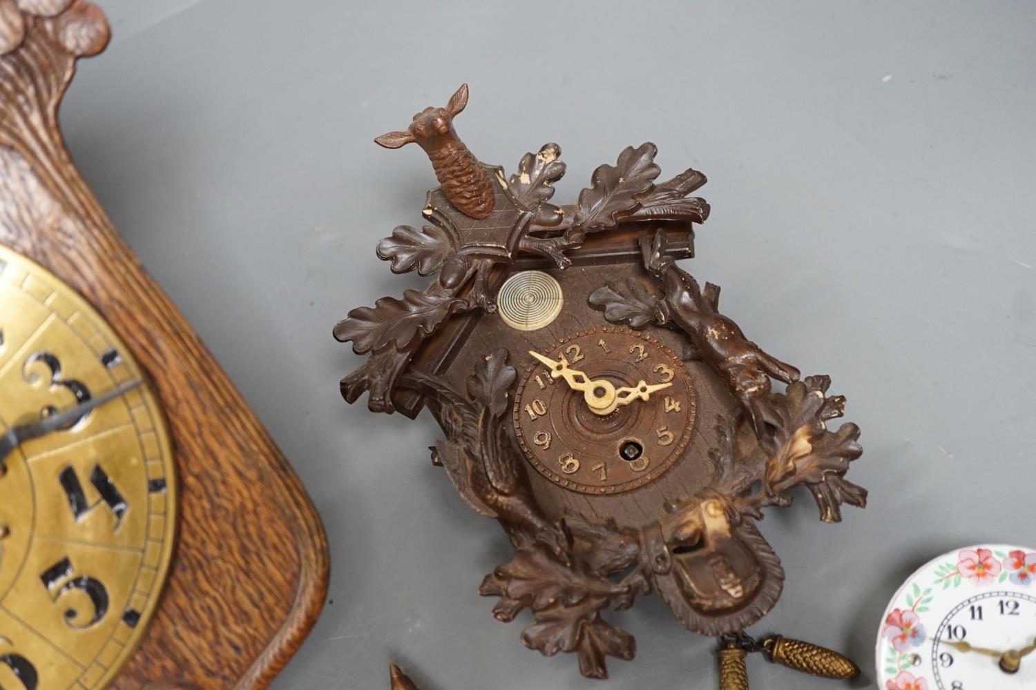 An early 20th century German Jugendstil oak wall timepiece, four miniature Black Forest timepieces - Image 5 of 8