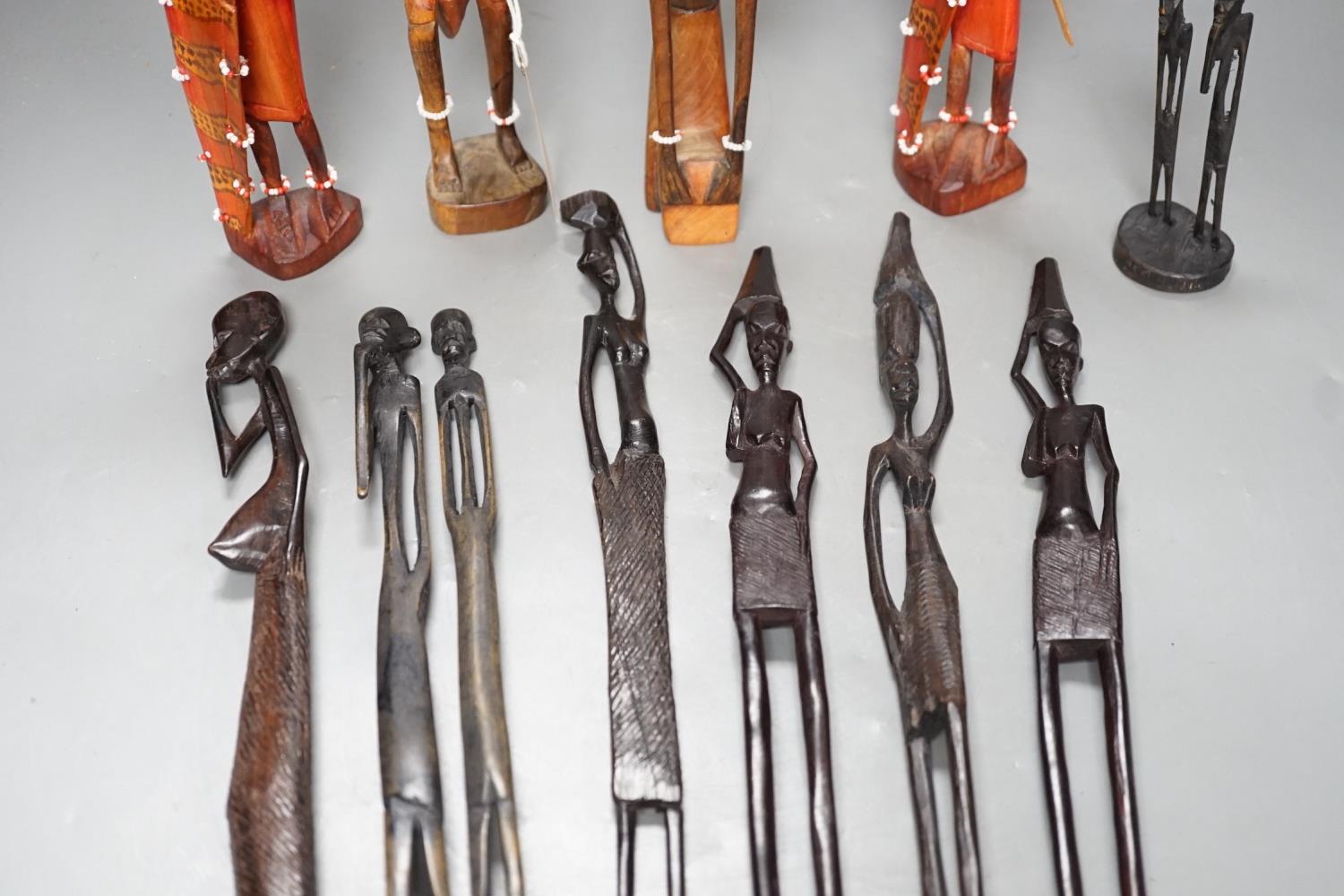 12 African carved wood stick figures, tallest 38cms high - Image 3 of 7