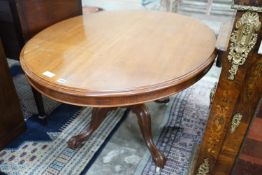 A Victorian mahogany oval tilt-top loo table width 134cms, depth 104, height 72cms.
