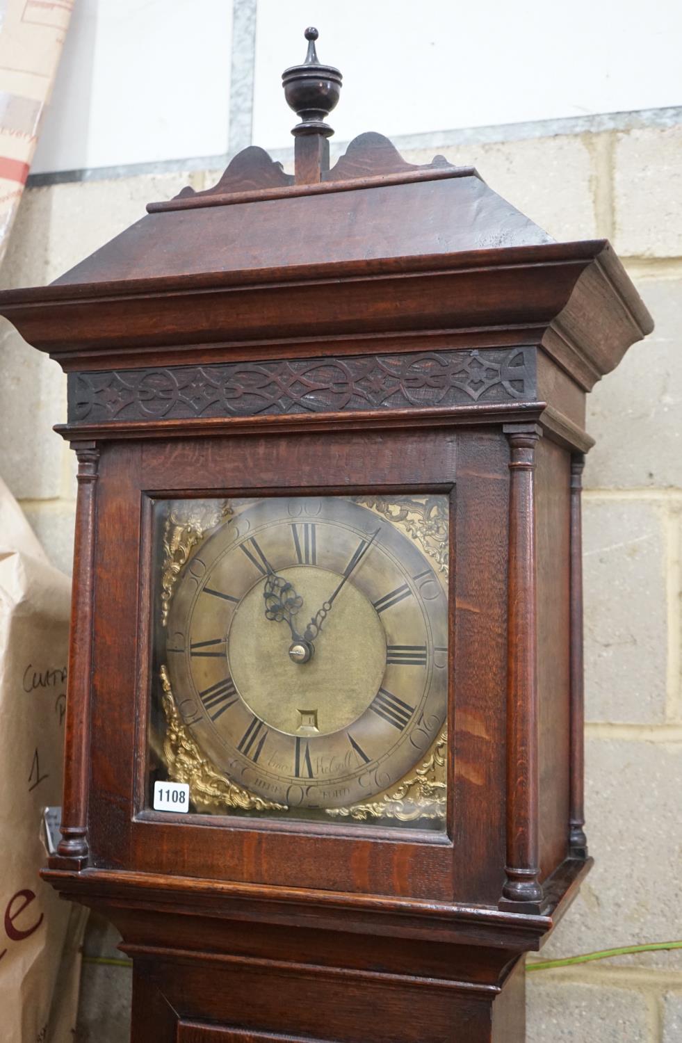 A George III oak 30 hour longcase clock, brass dial marked Amos Kelsall, Hereford, height 220cms.