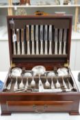 A silver plated two tier canteen of cutlery,