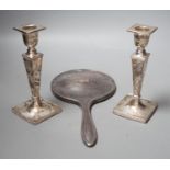 A pair of George V silver candlesticks, with tapering stems, Walker & Hall, Sheffield, 1915, 16.4cm,