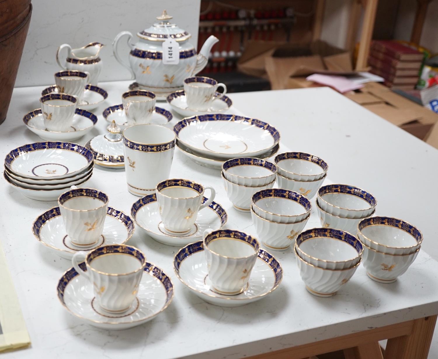 A Flight and Barr, Worcester blue and gilt bordered part tea and coffee service, c.1795, incised B