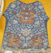 An early 20th century Chinese silk embroidered panel, from a robe, embroidered in metallic and