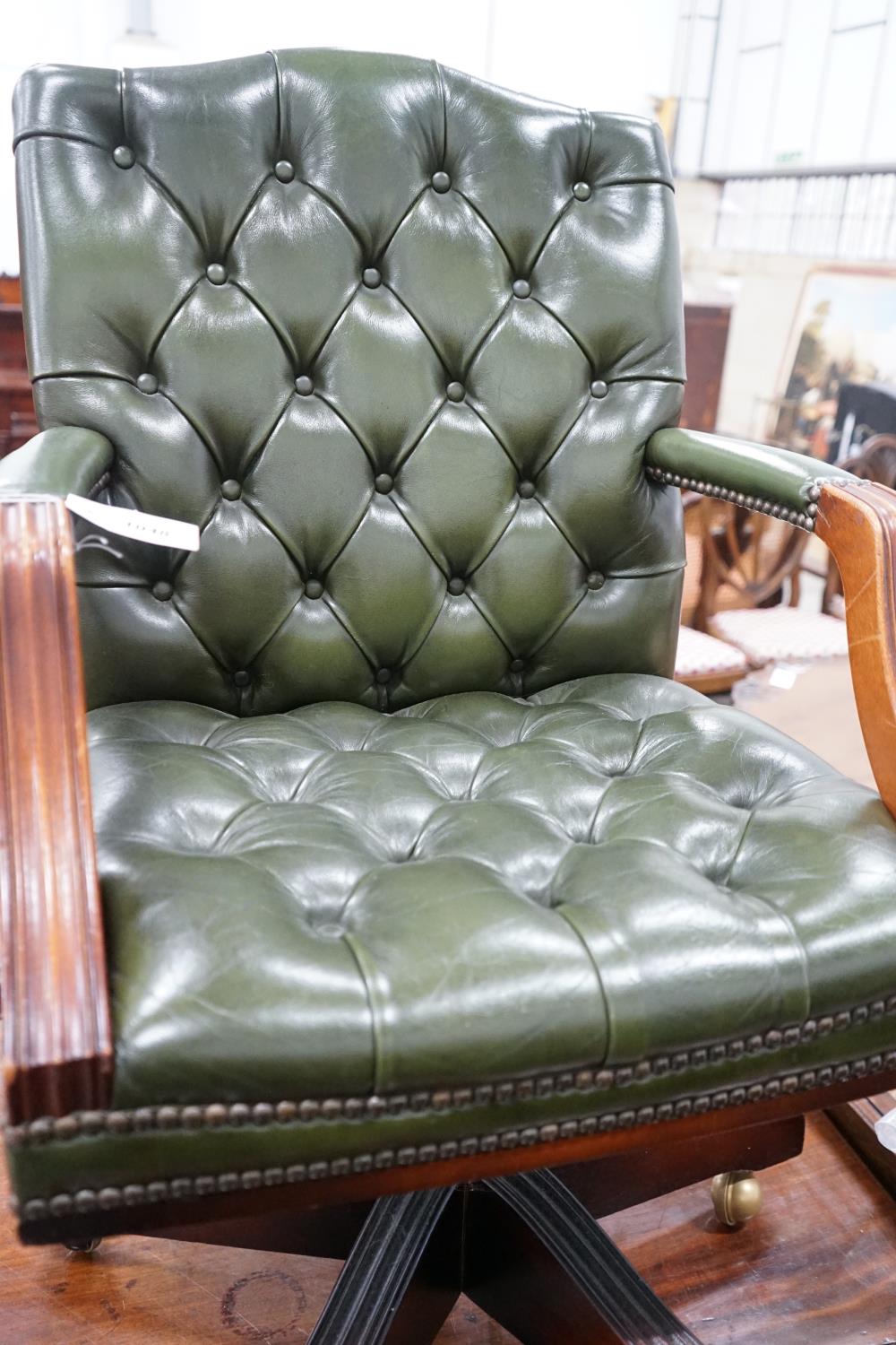 A reproduction mahogany and buttoned green leather swivel desk chair, width 56cm, depth 51cm, height - Image 4 of 4